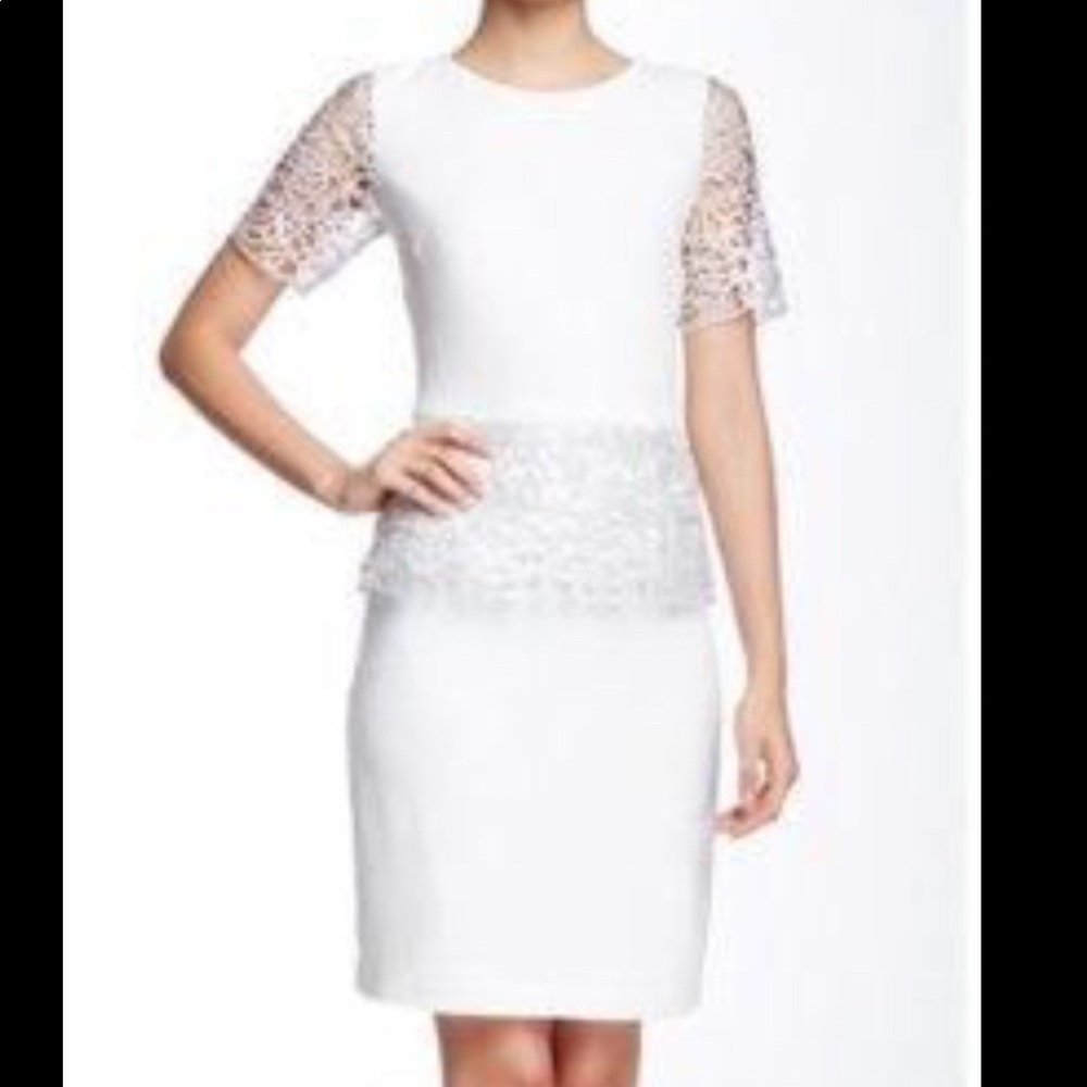 White Pepulum dress with silver details